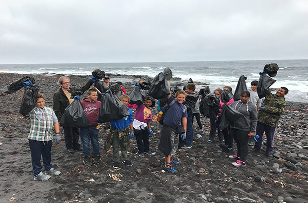 school children taking part in the marine litter survey at Hottentot Beach