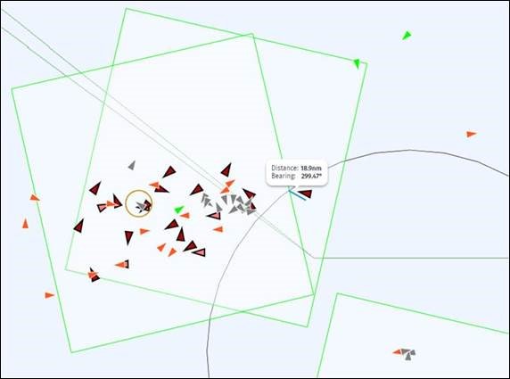 Satellite image showing vessels at sea.